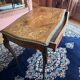 Desk, rosewood marquetry table, bronze ornaments dating from the late 19th century.