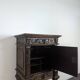 Renaissance-style cabinet in solid oak decorated with chimeras and caryatids