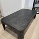 Industrial coffee table in riveted metal from around 1920 – black patina – 145 × 80 cm