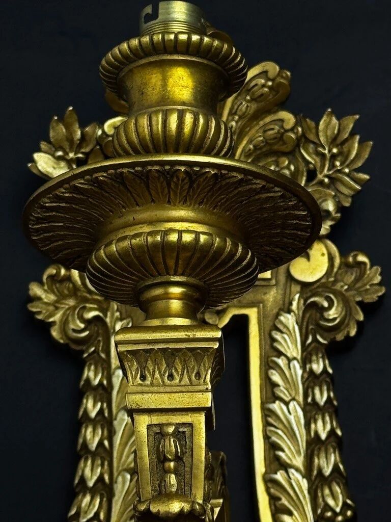 A pair of important gilt bronze wall sconces, Louis XVI style, 19th century.