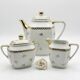 Three-piece tea or coffee service in Limoges porcelain by Singer, years.