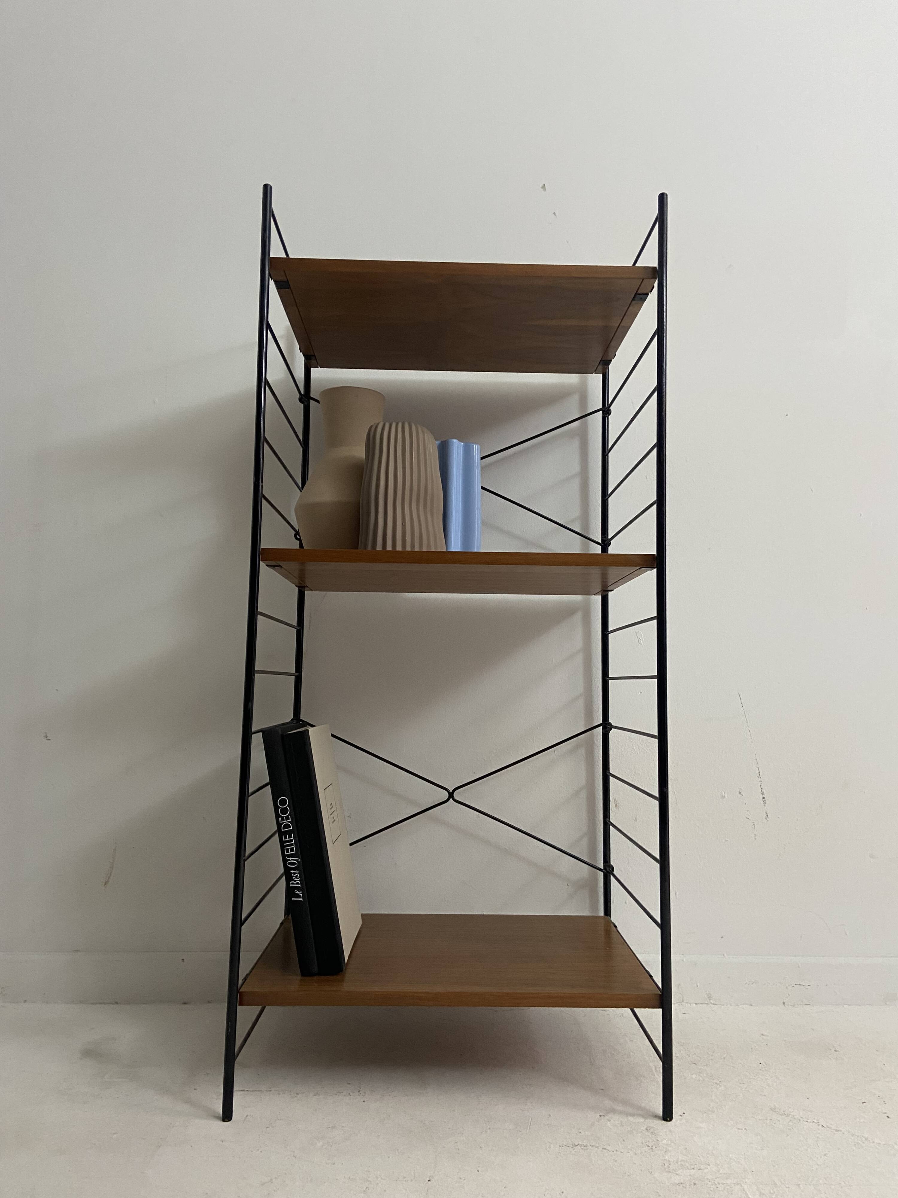 small vintage metal and teak string bookshelf