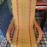 Braided rattan armchair