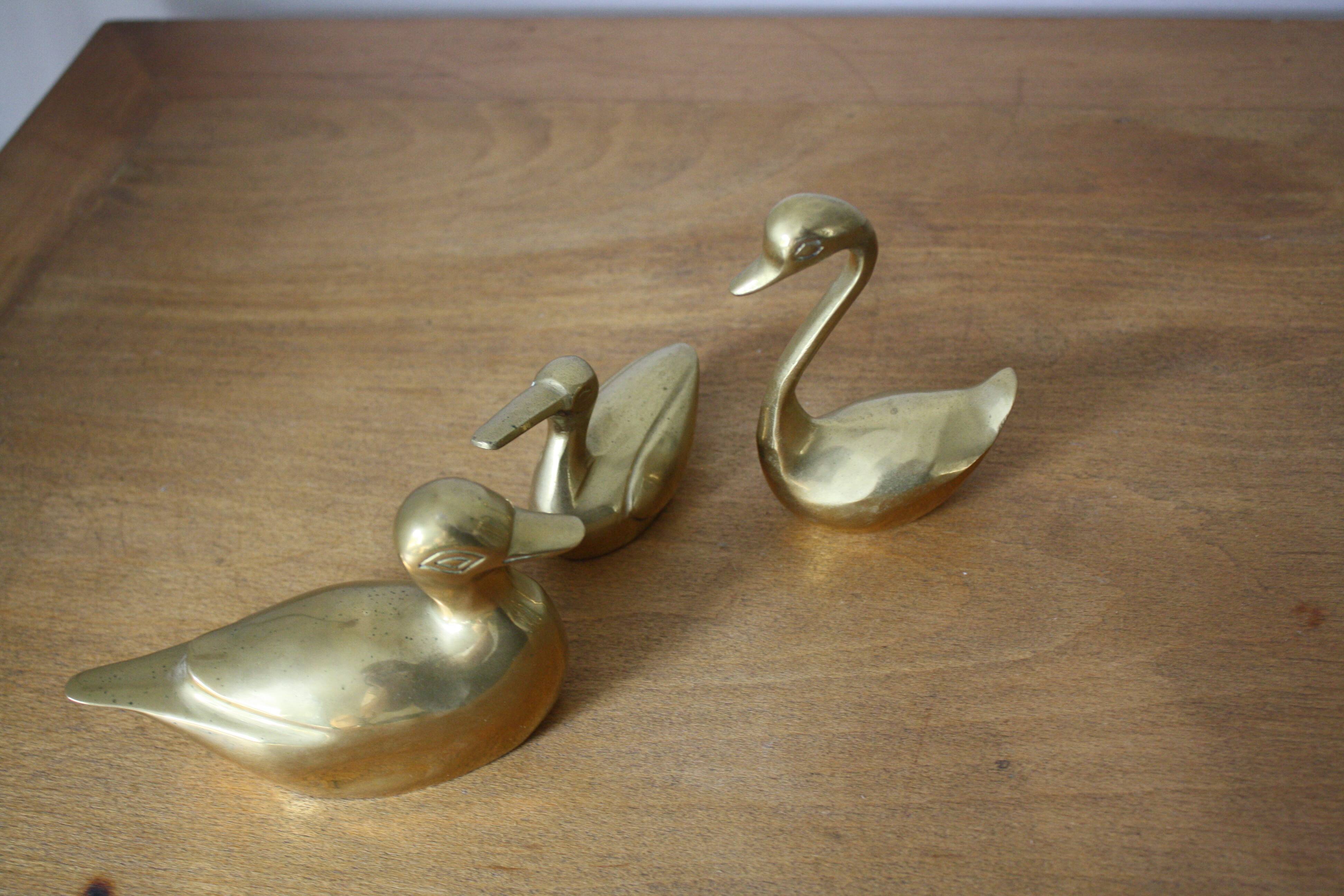 Set of 2 ducks and 1 brass swan