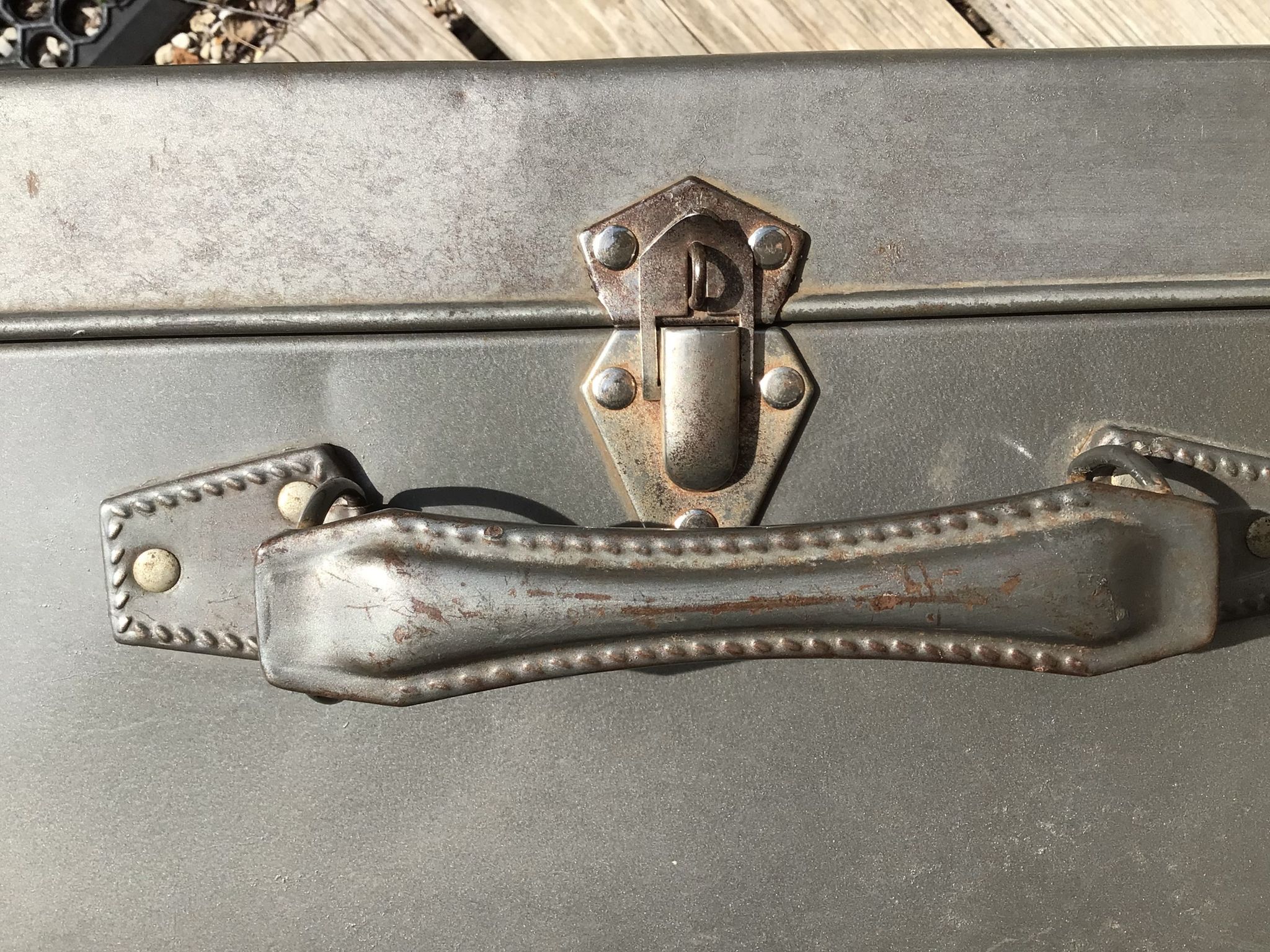 Vintage dark grey metal suitcase