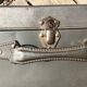 Vintage dark grey metal suitcase