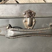 Vintage dark grey metal suitcase