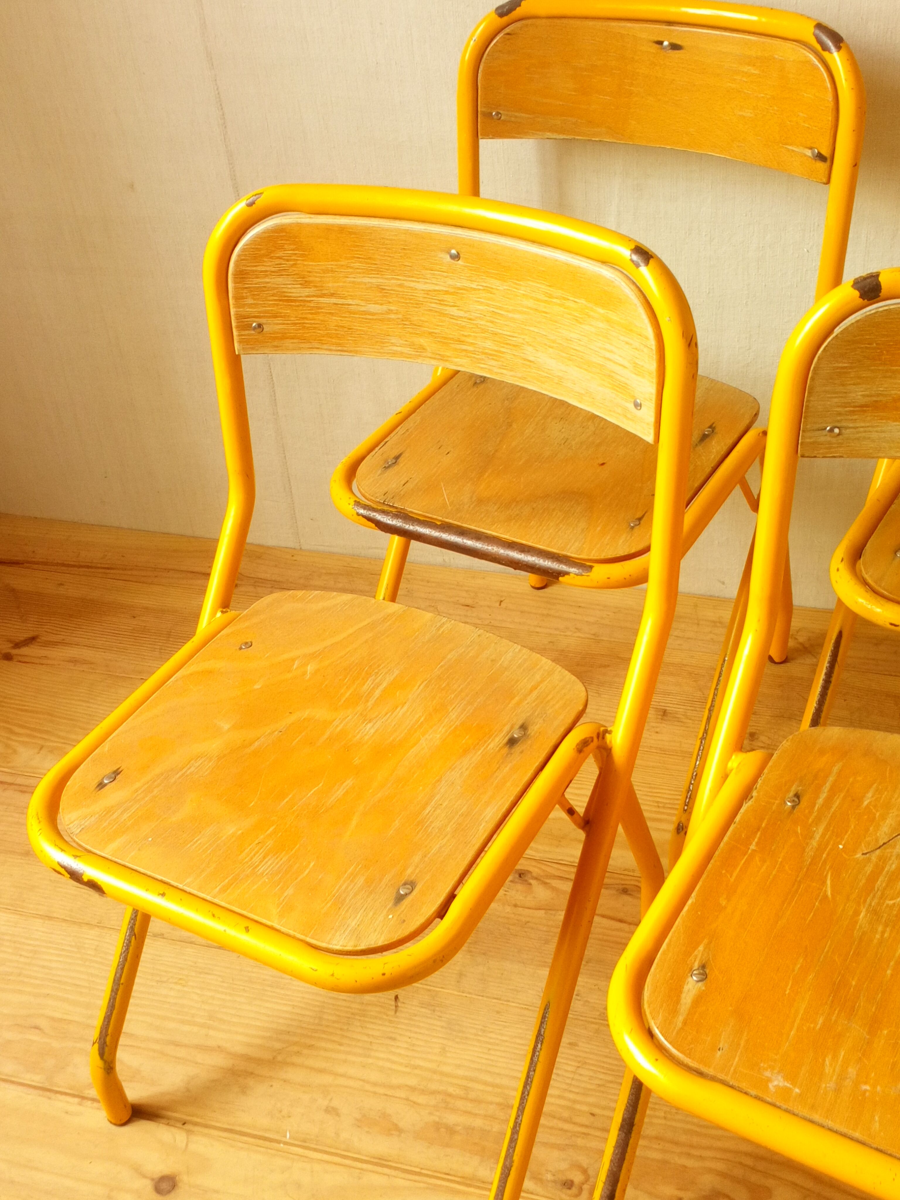 Four school chairs