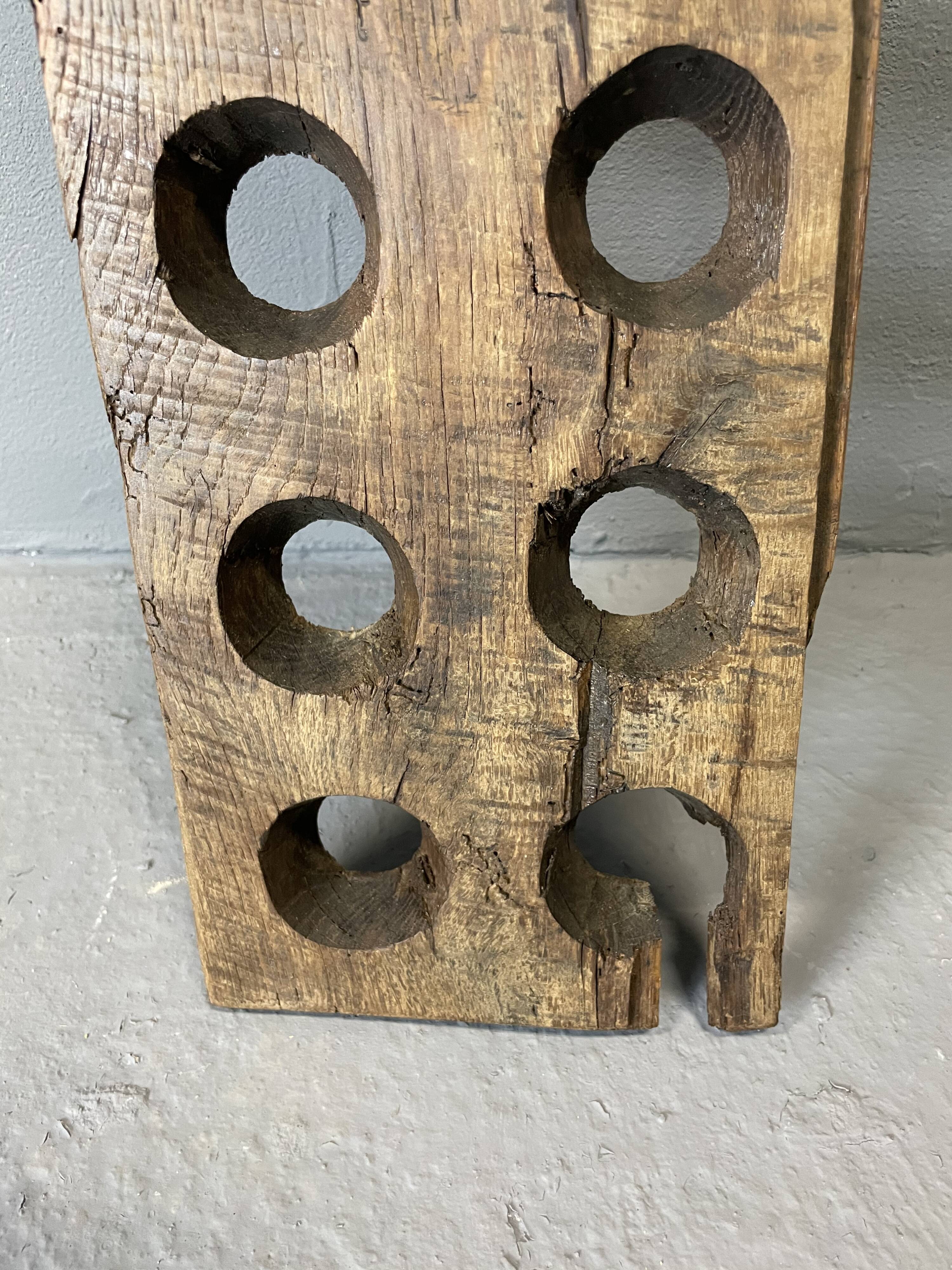 Brutalist oak bottle rack, late nineteenth century