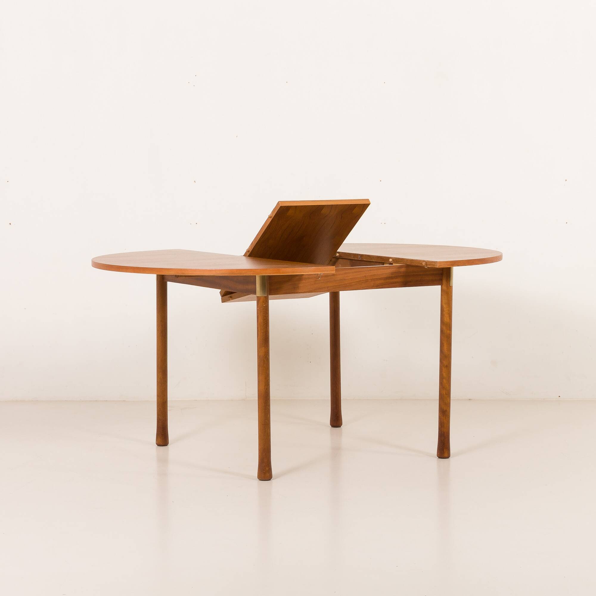 Italian mid-century round extension teak table with brass details, 1960s