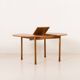 Italian mid-century round extension teak table with brass details, 1960s