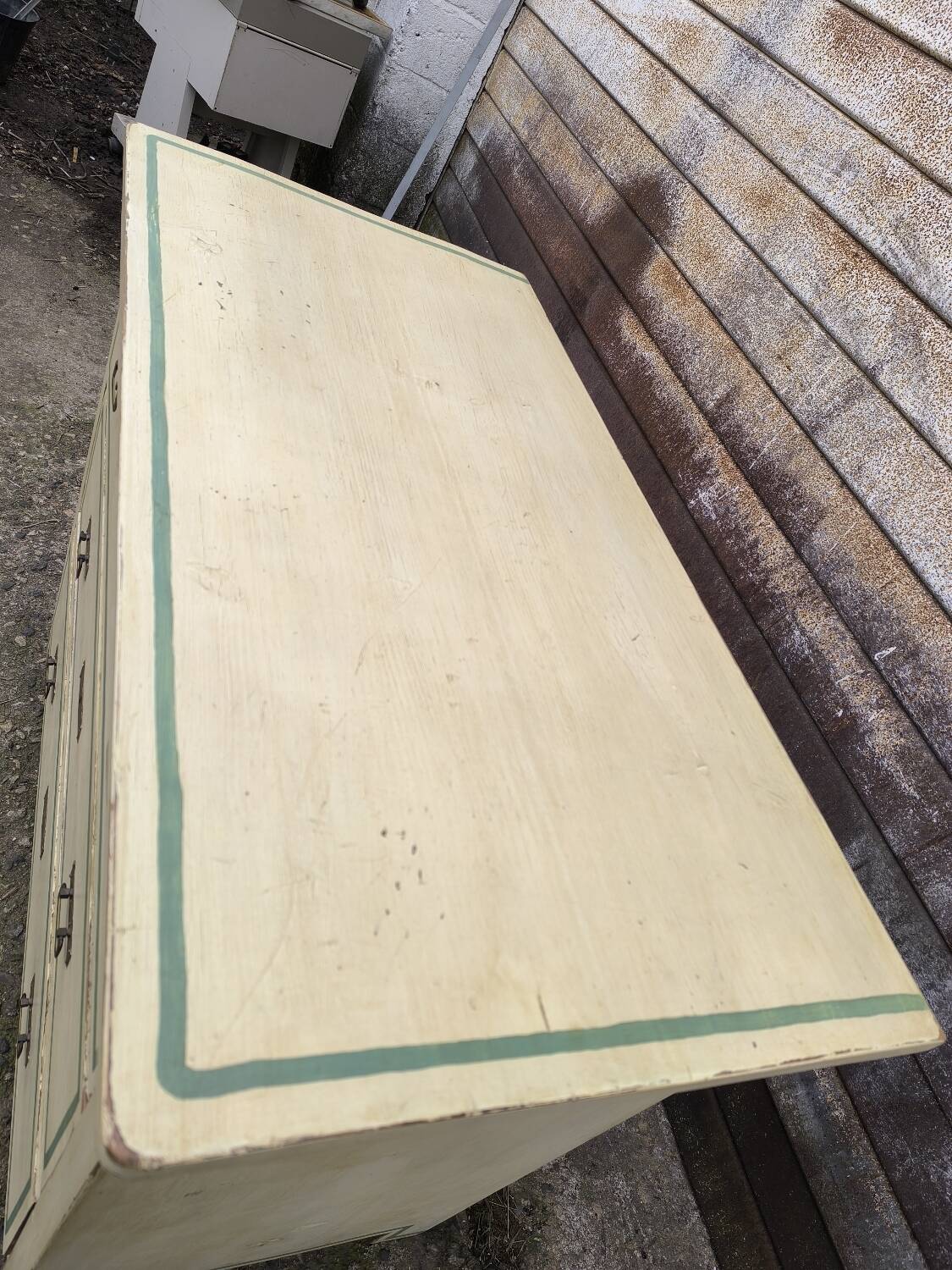 4-drawer chest of drawers with yellow and green patina by a local artist