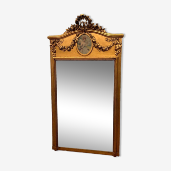 Louis XVI style mirror in wood and gilded stucco 20th century