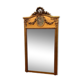 Miroir de style Louis XVI en bois et stuc doré XX siècle