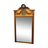 Louis XVI style mirror in wood and gilded stucco 20th century
