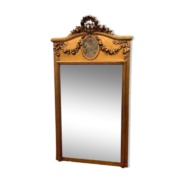 Louis XVI style mirror in wood and gilded stucco 20th century
