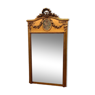 Louis XVI style mirror in wood and gilded stucco 20th century