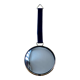 Vintage witch's eye curved mirror hangs velvet ribbon