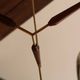 Scandinavian chandelier "Cascade" from the 1960s in brass, teak, and smoked glass.