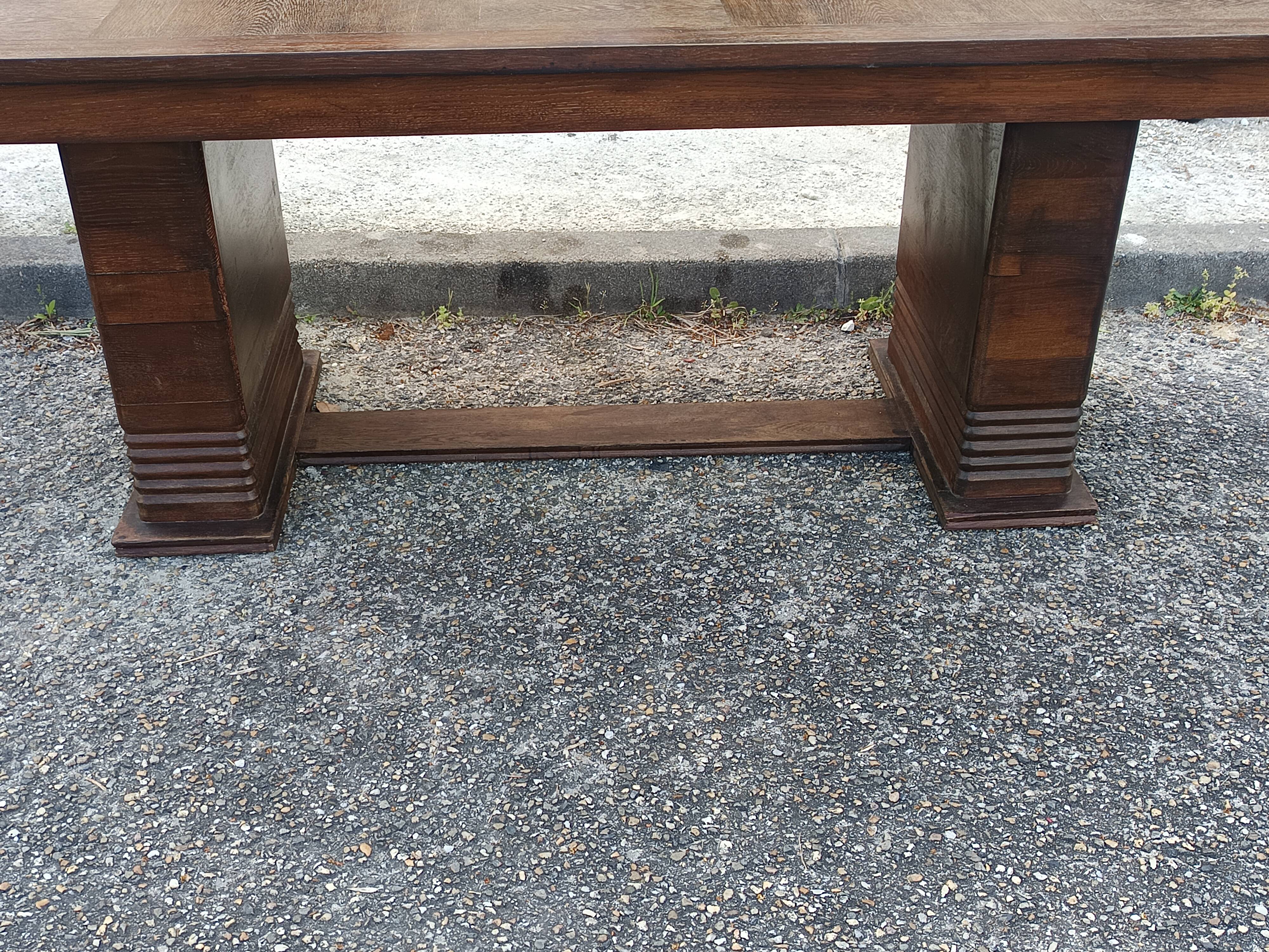 Art Deco dining table in solid oak – in the style of Dudouyt