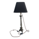 Old candle holder transformed into a lamp.