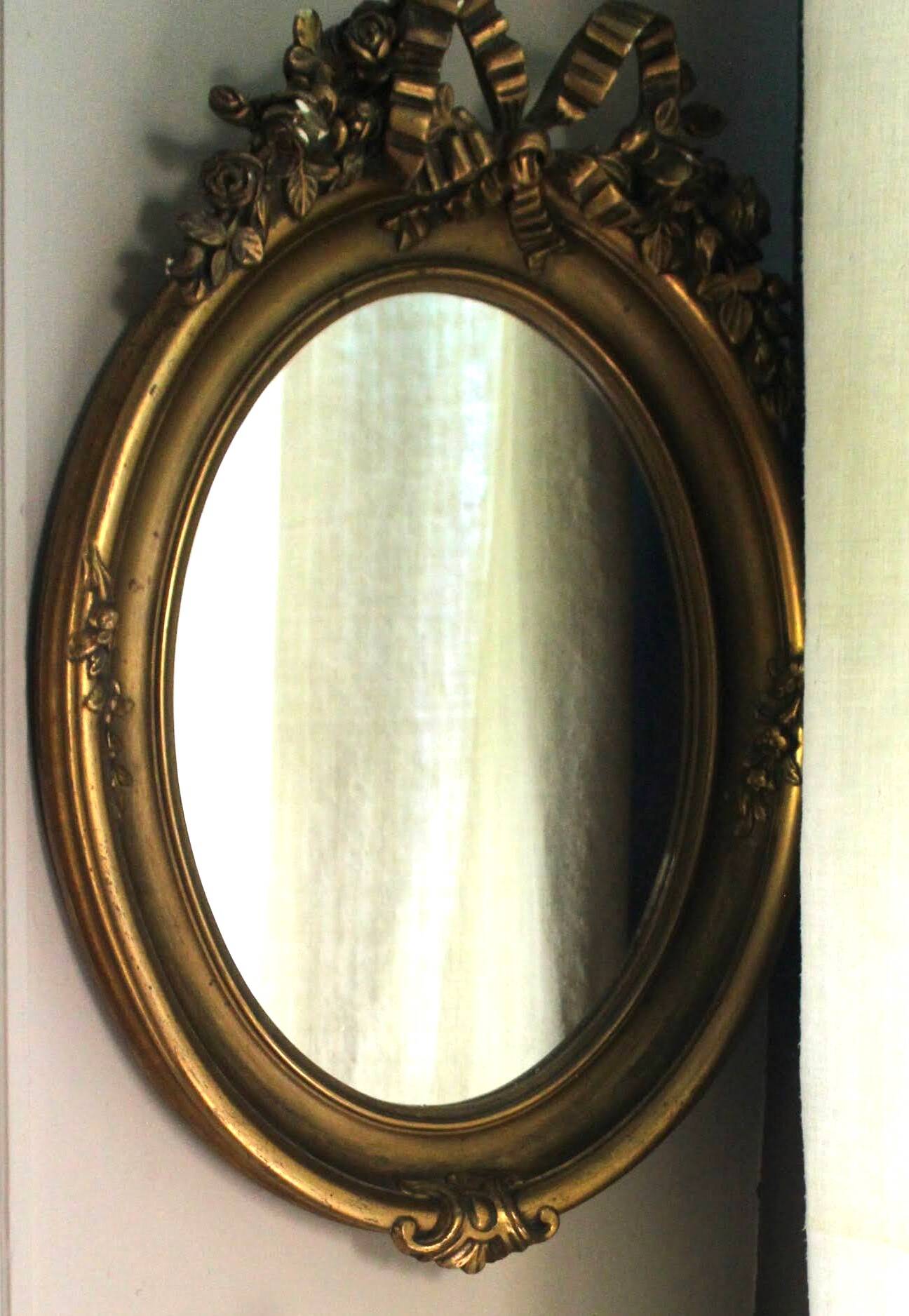 Golden Oval Mirror with Bow and Roses Decor
