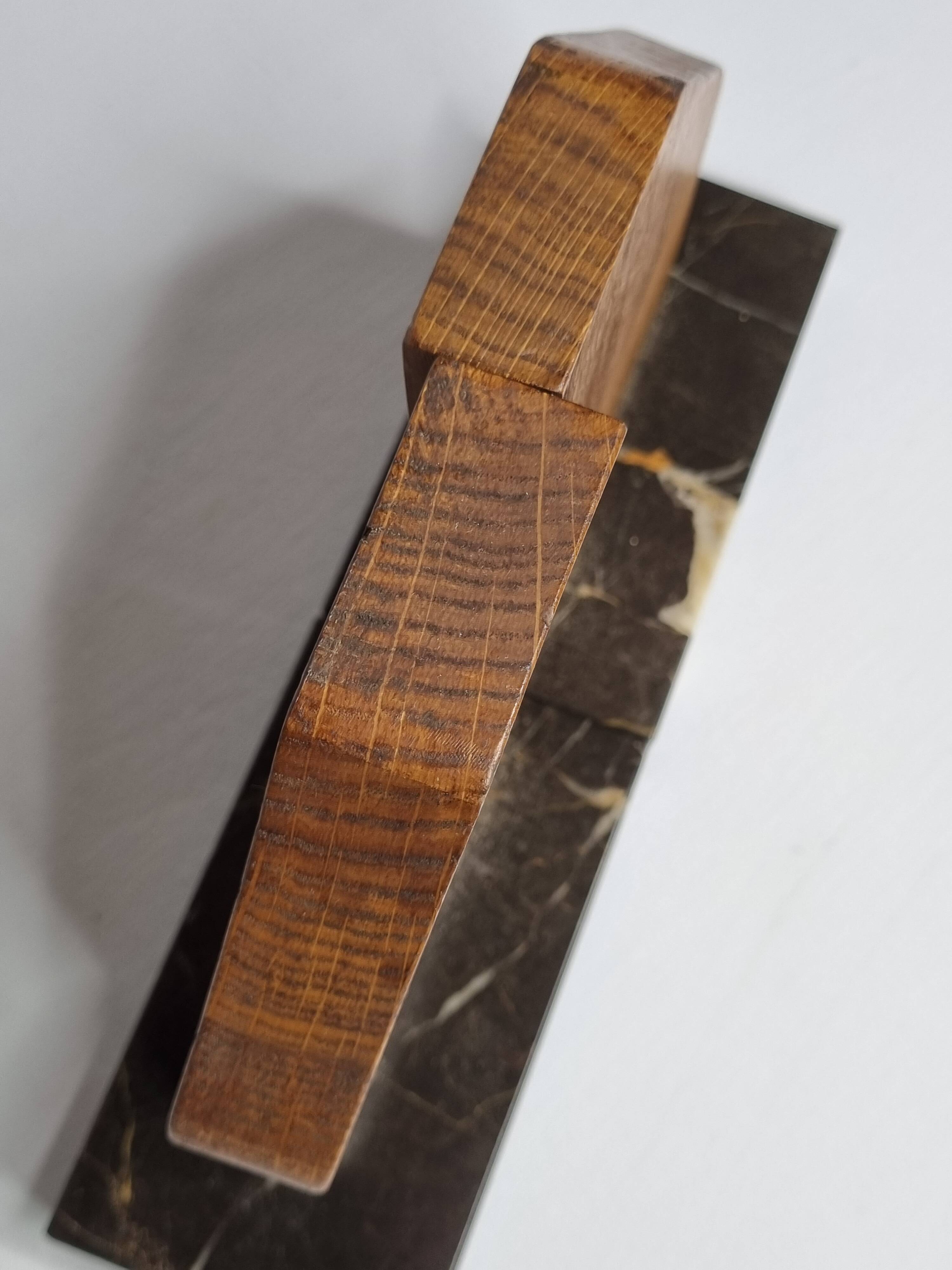 Pair of Art Deco bookends in solid wood and veined black marble