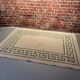White and green rectangular rug