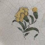 Late 18th century earthenware plate with dandelion decoration