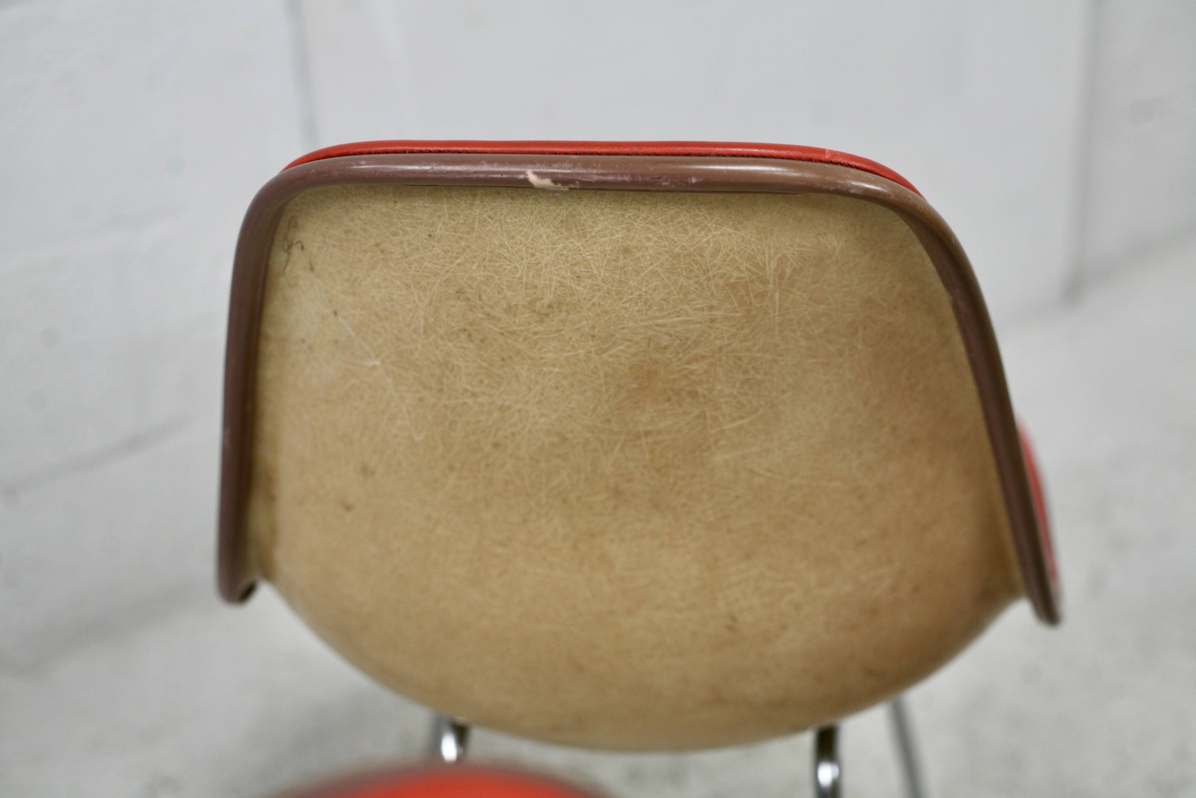 Ray & Charles Eames, Herman Miller edition, set of 4 orange chairs. Circa 1960