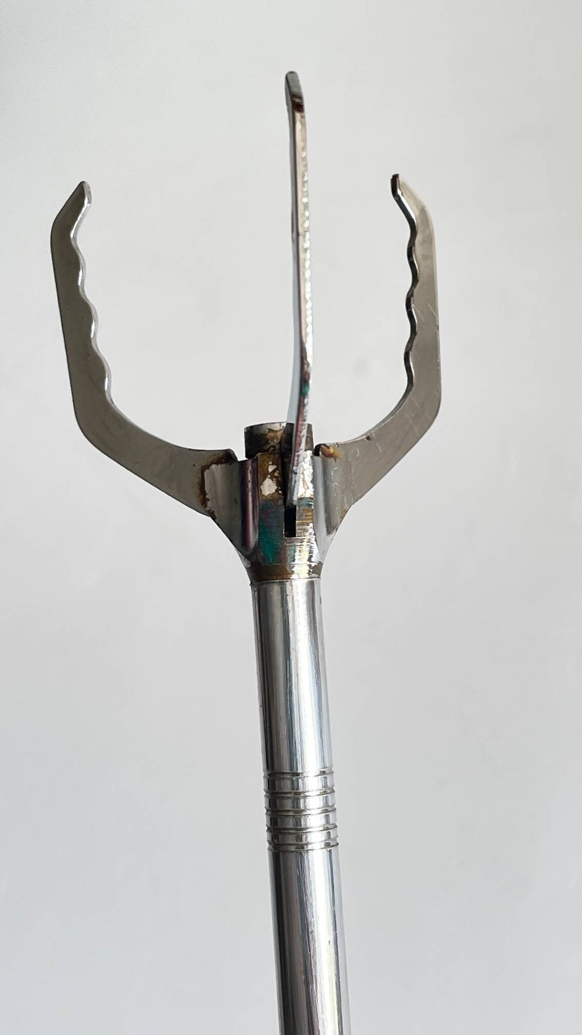 Long vintage chrome metal sugar tongs