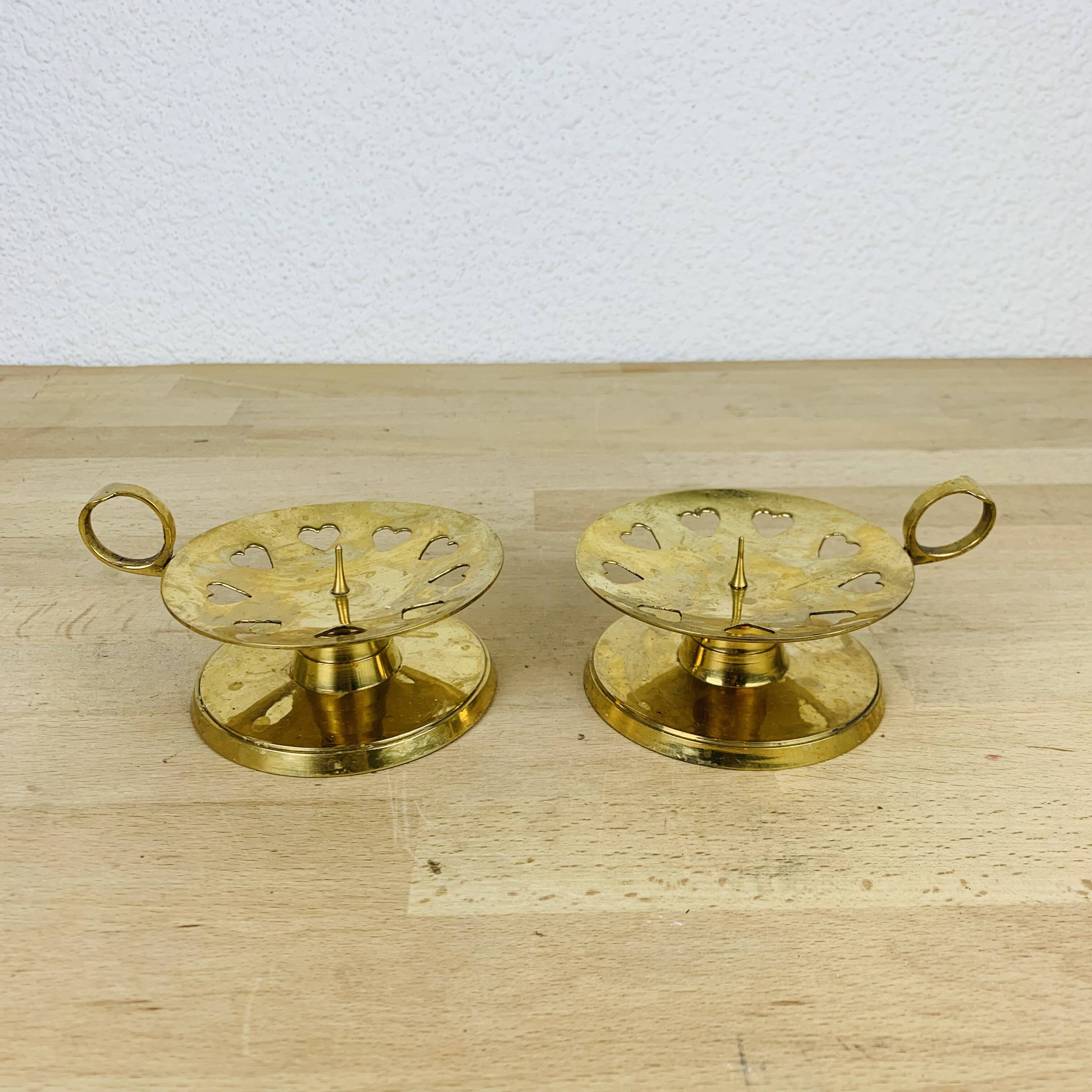 Pair of gilded brass cellar rat candlesticks