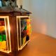 Copper lantern table lamp and 60s multicolored glasses