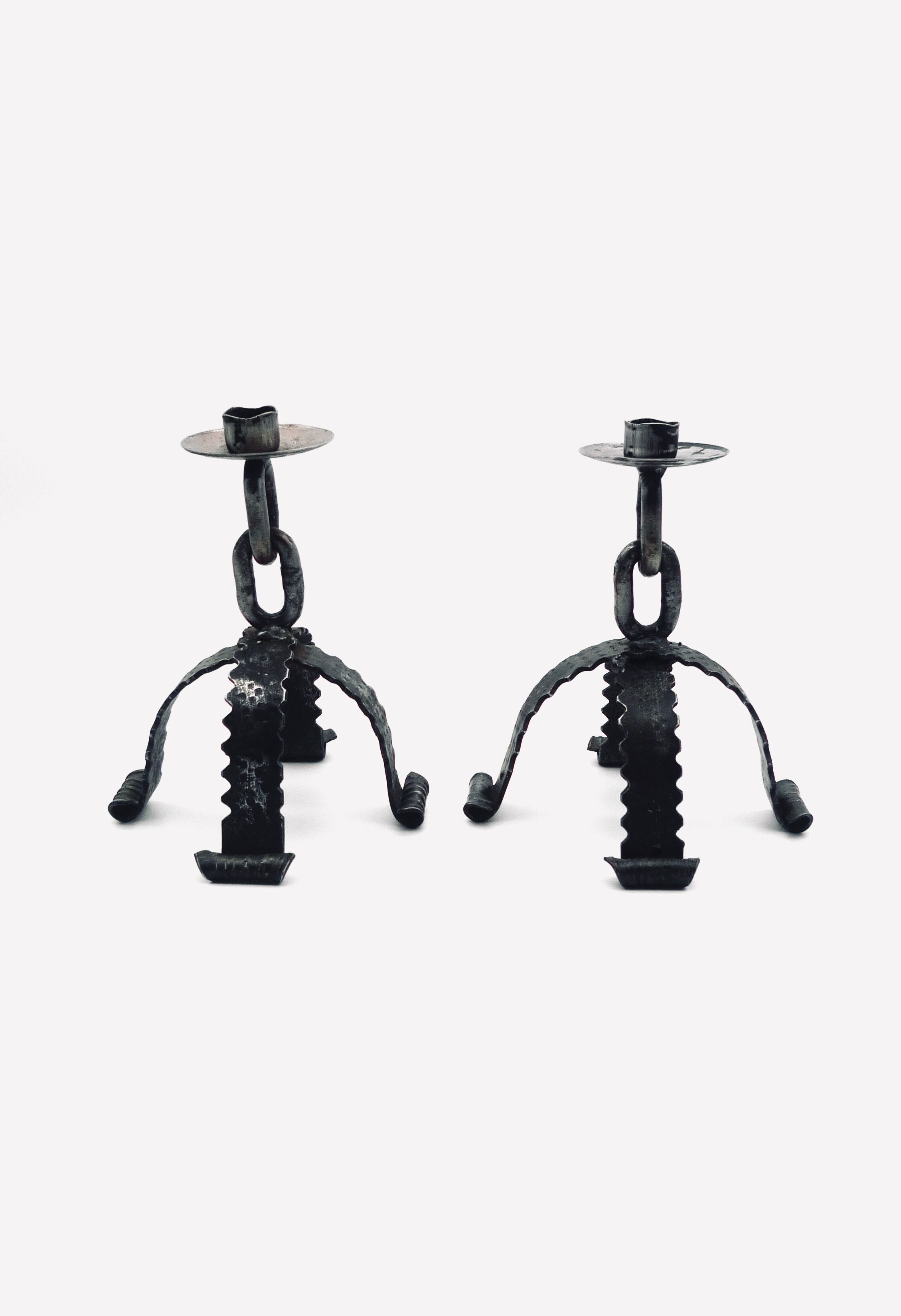 Set of two wrought iron candle holders