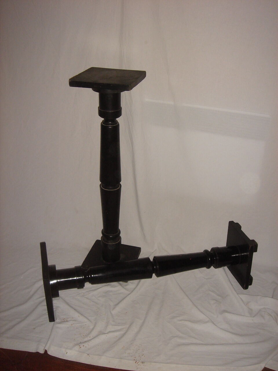 2 black wooden columns from 1970