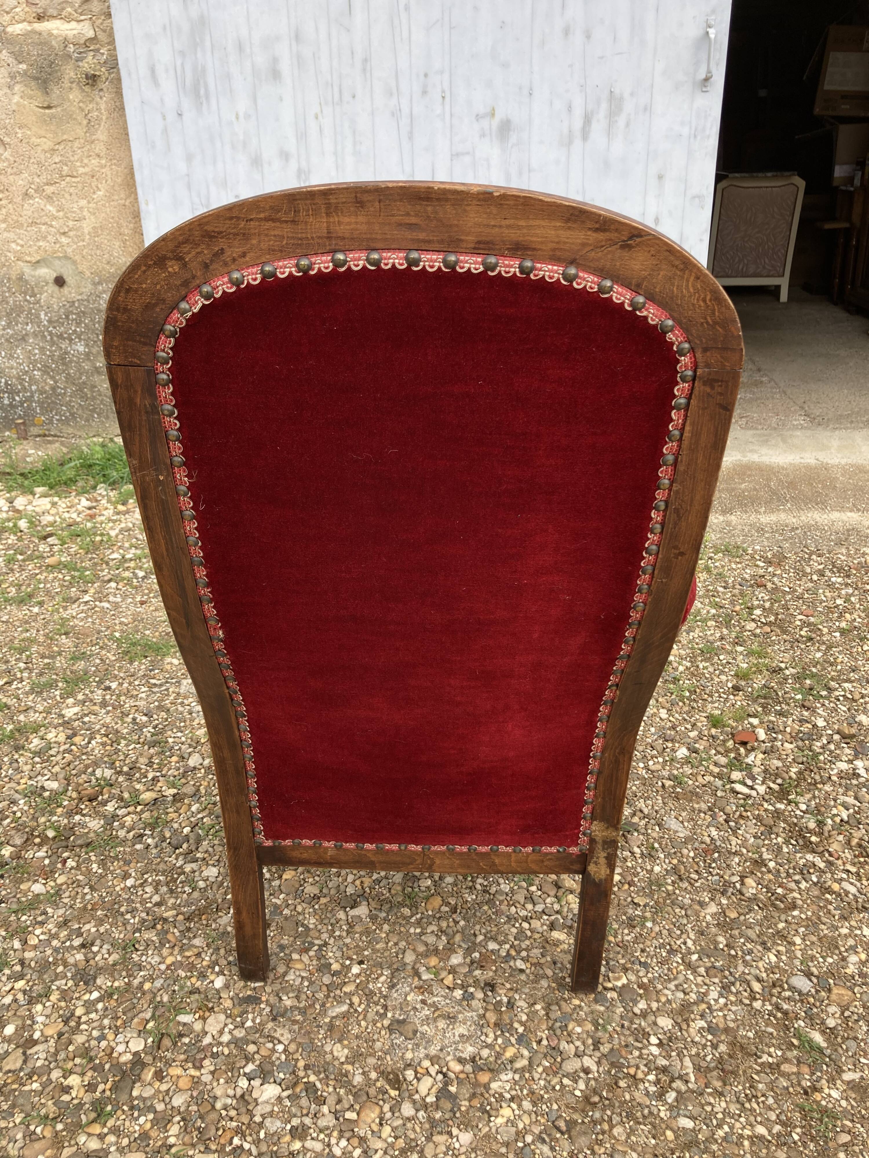 Red velvet voltaire armchair