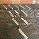 Set of 11 vintage aluminium knife rests from the 1970s