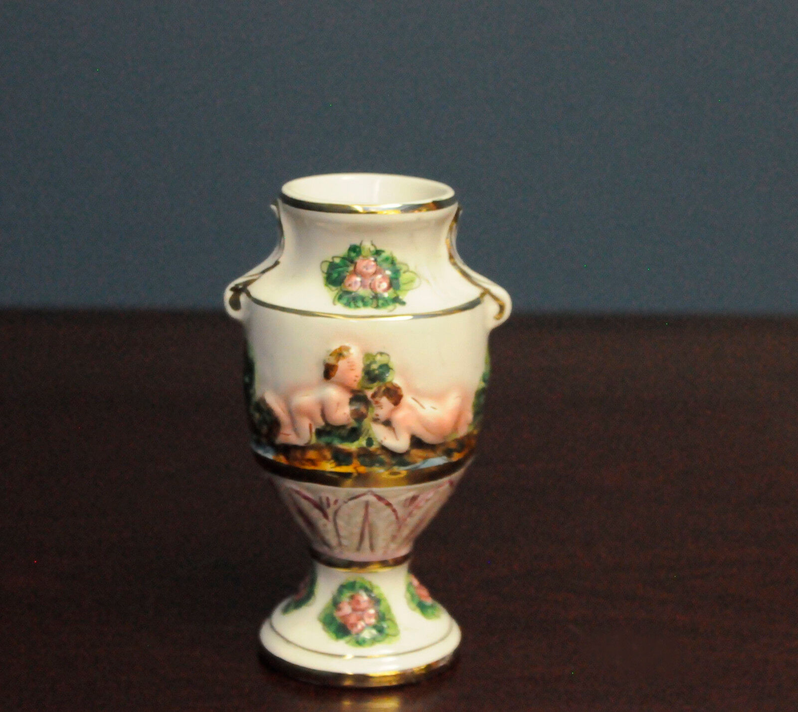 Amphora Capo Di Monte hand painted.