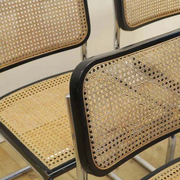 Set of 4 black rattan and metal chairs, Denmark 1960.