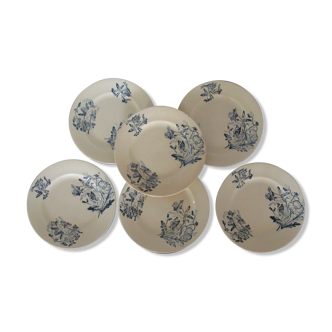Service d'assiettes en faience décor papillons
