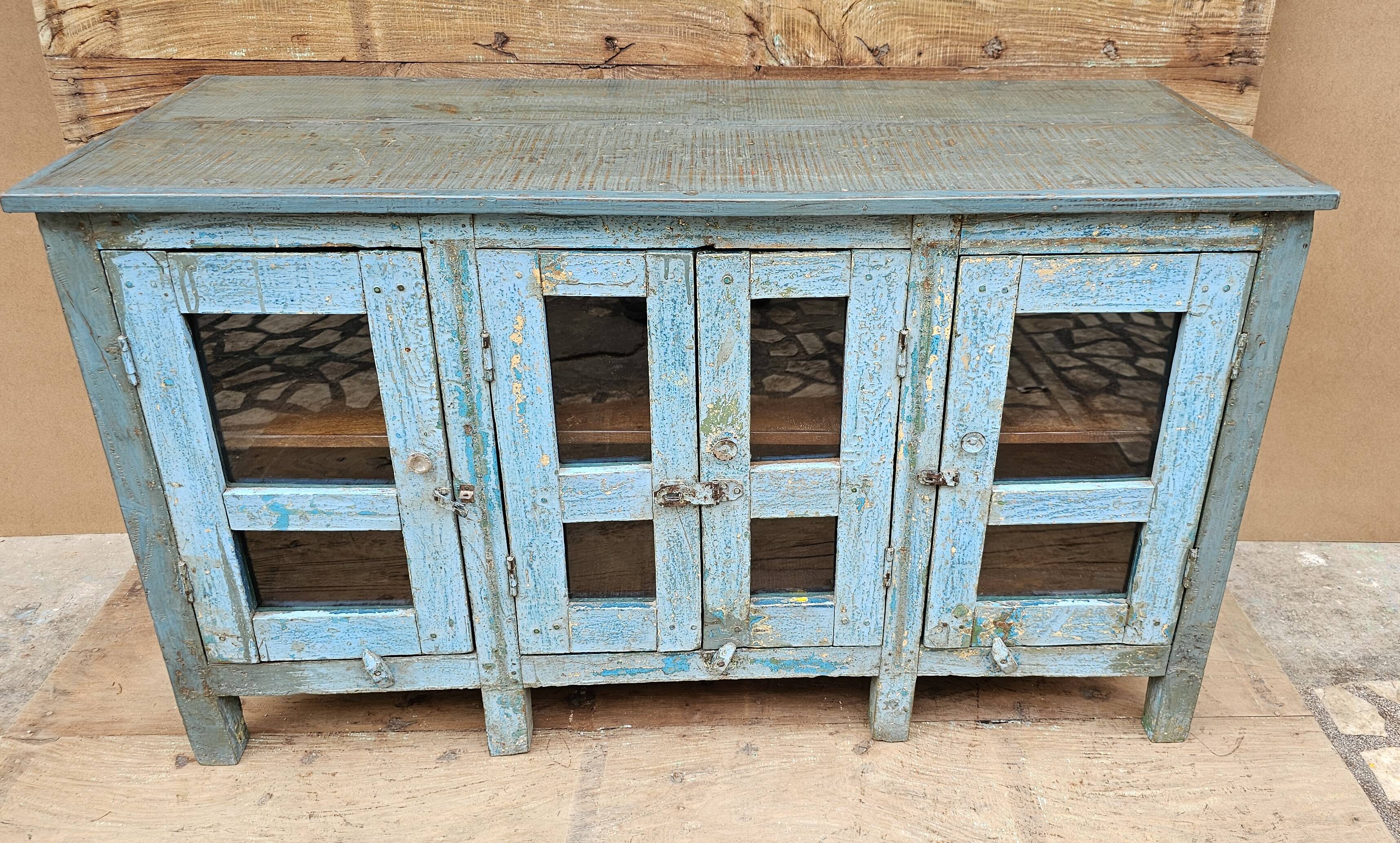 Antique glass-fronted buffet in Burmese teak
