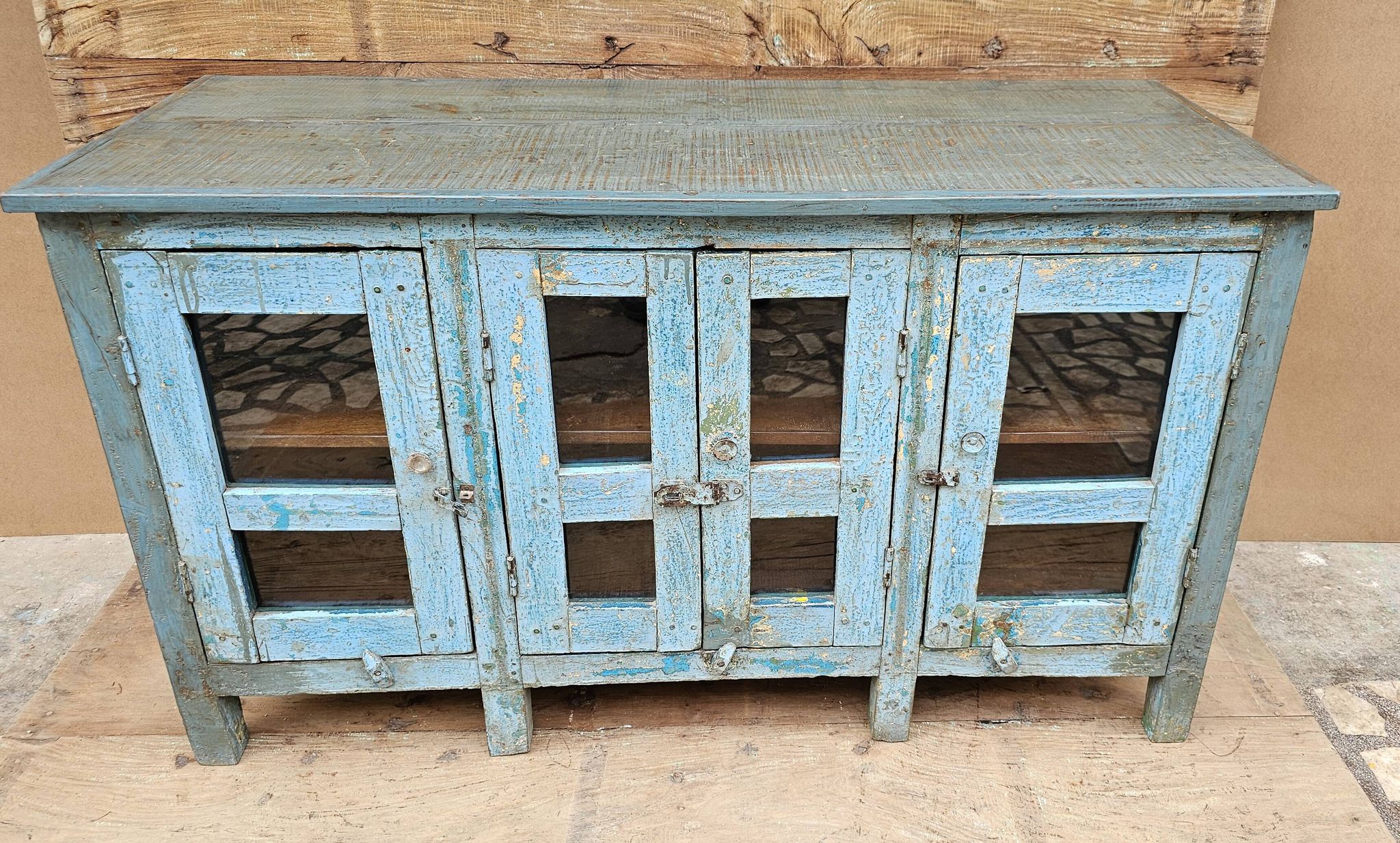 Antique glass-fronted buffet in Burmese teak