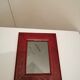 Carved wooden wall frame