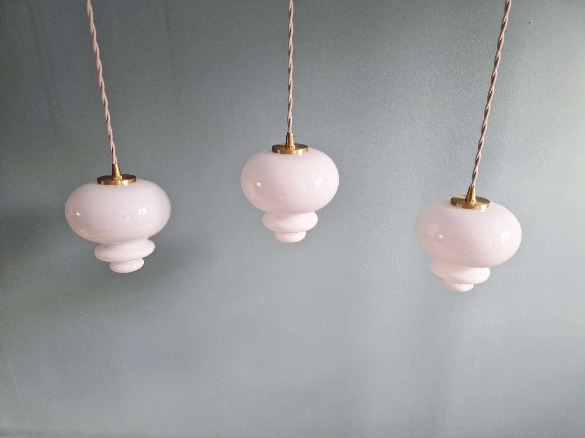Scandinavian trio of suspensions in white opaline, 1960.