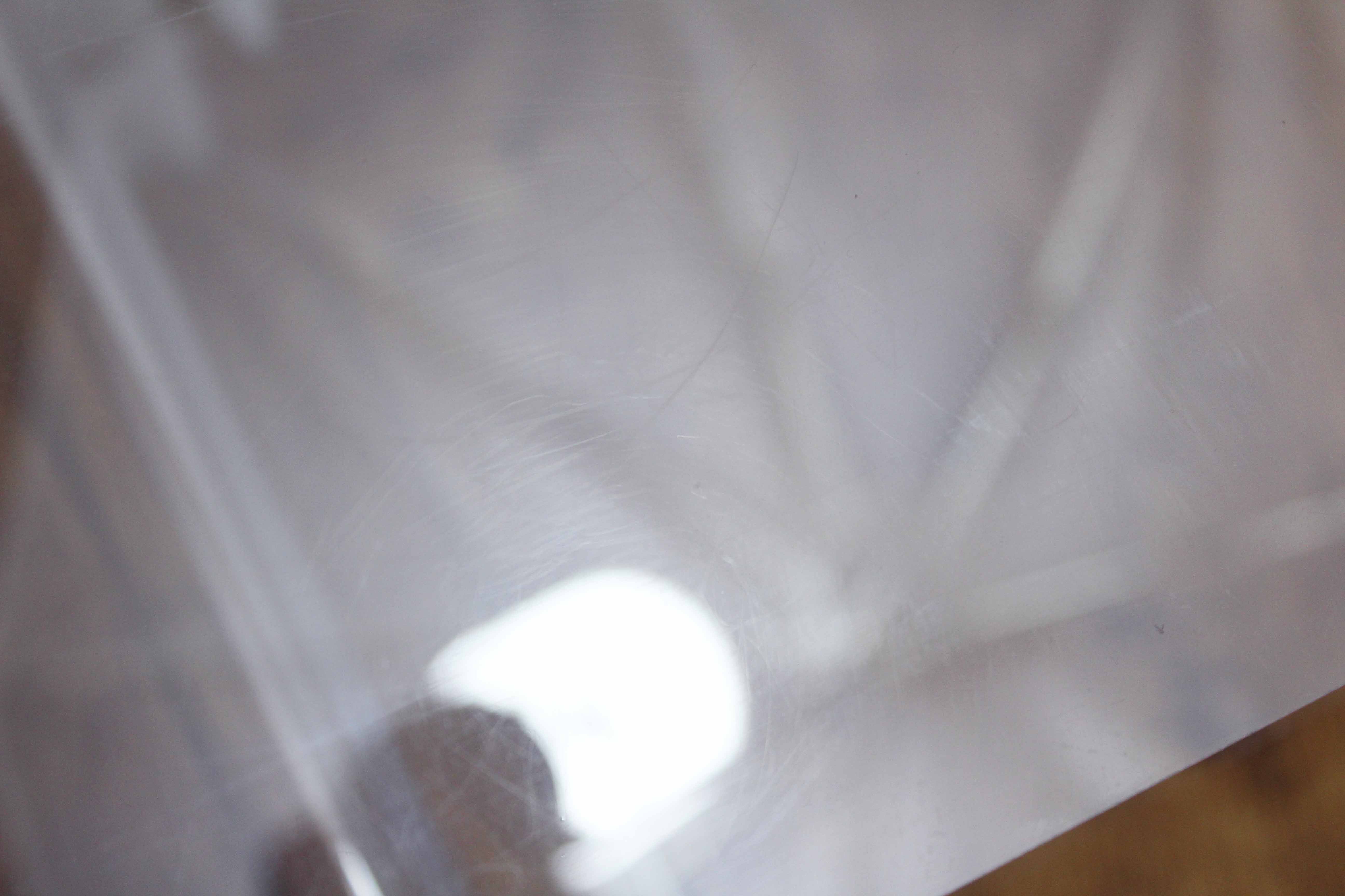 Plexiglas sofa end magazine holder