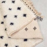 Moroccan polka dot hallway, white and brown beni ourain rug, berber design