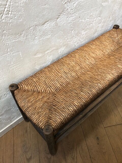 Wooden and straw bench