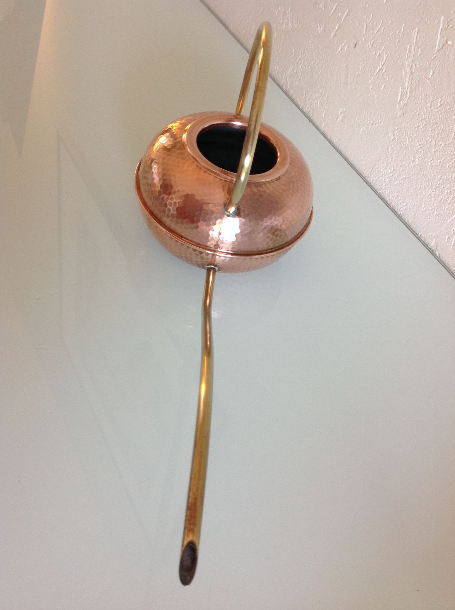 Red copper watering can in Scandinavian style 60s-70s