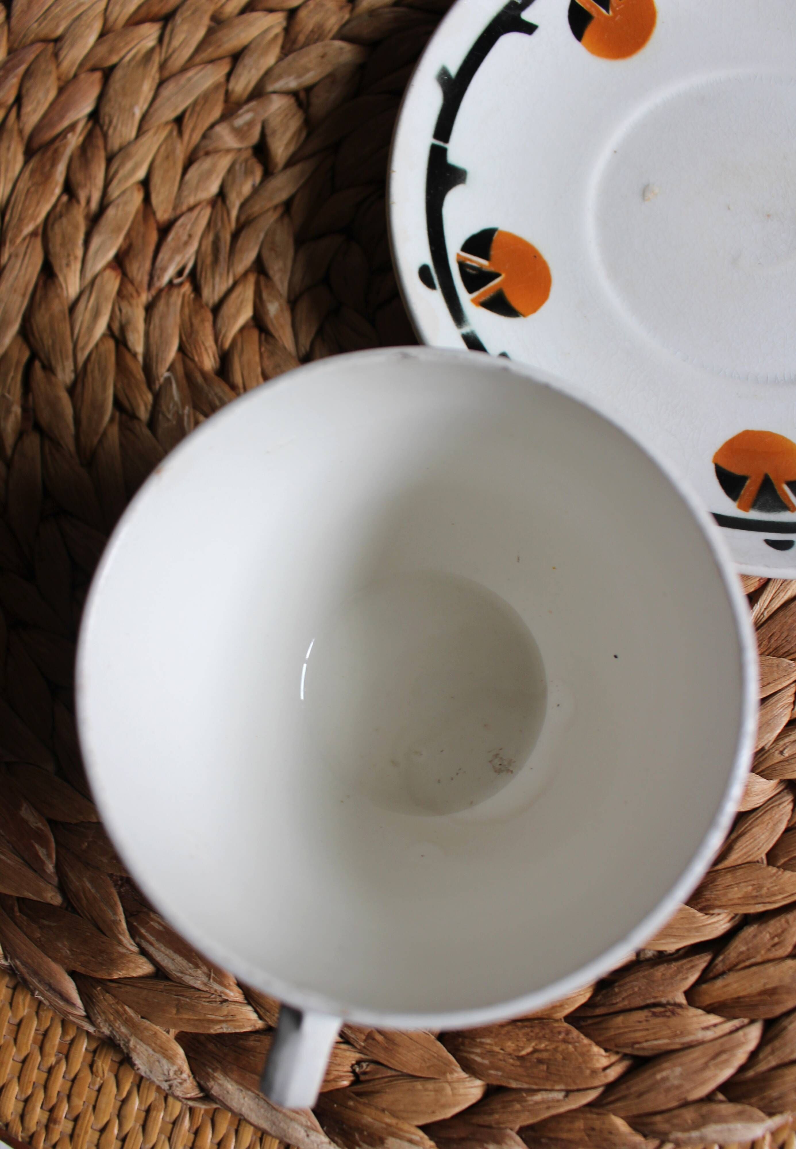 A large cup of chocolate tea, saucer Badonviller Barcarolle orange black.
