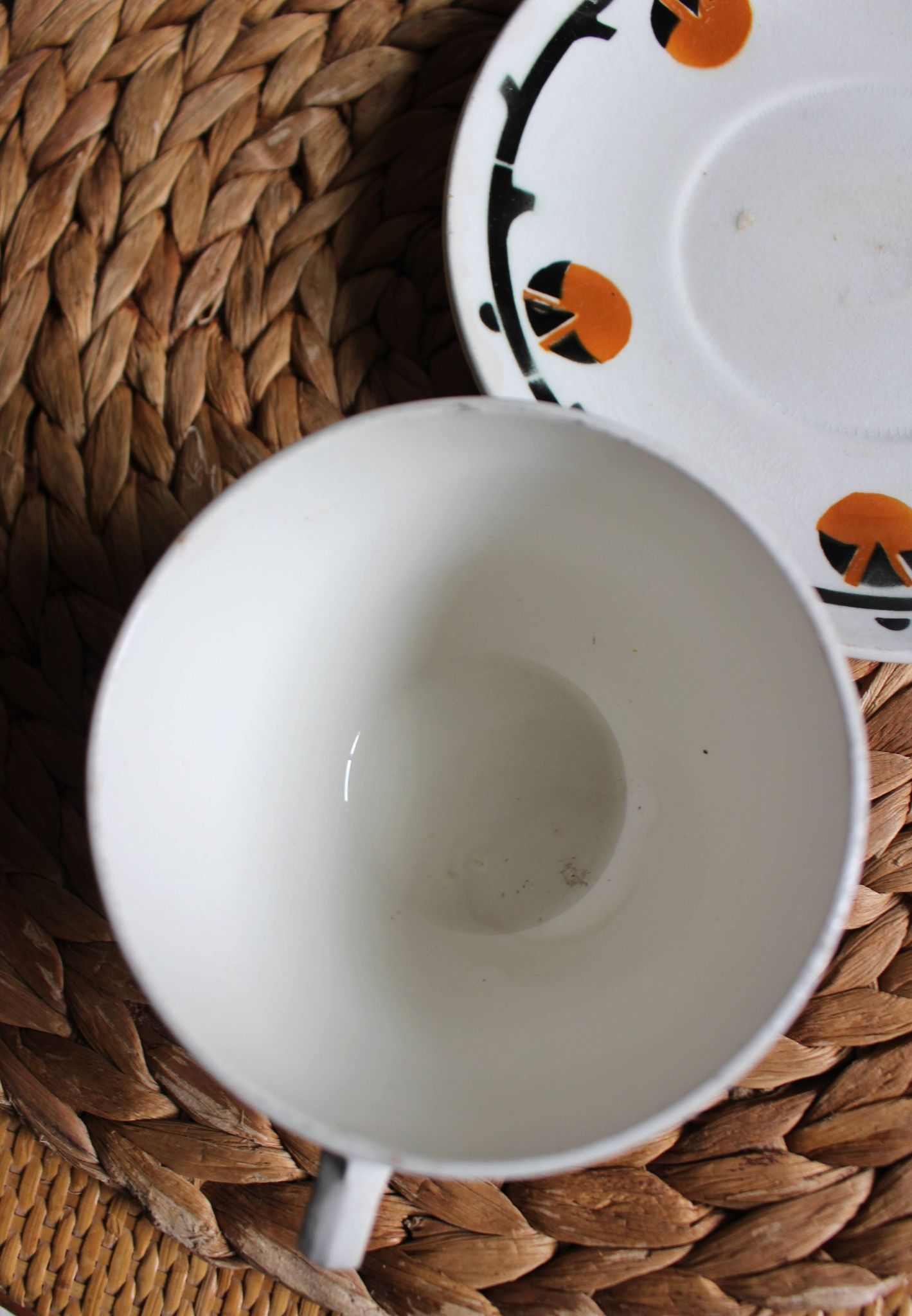 A large cup of chocolate tea, saucer Badonviller Barcarolle orange black.